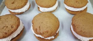 Pumpkin whoopie pies on a tray