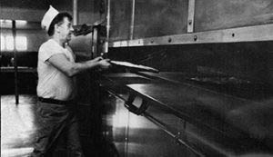 Bob Mathews baking bread, circa 1984