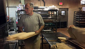 Robert Mathews baking bread, 2017