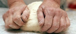 Hands Kneading Dough